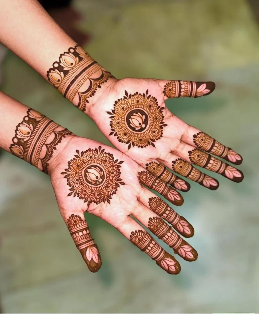 eautiful mandala-themed mehndi design featuring delicate floral accents and neat finger detailing on both hands